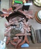 WEST GERMANY CUCKOO CLOCK. BIRD ON TOP IS CHIPPED.