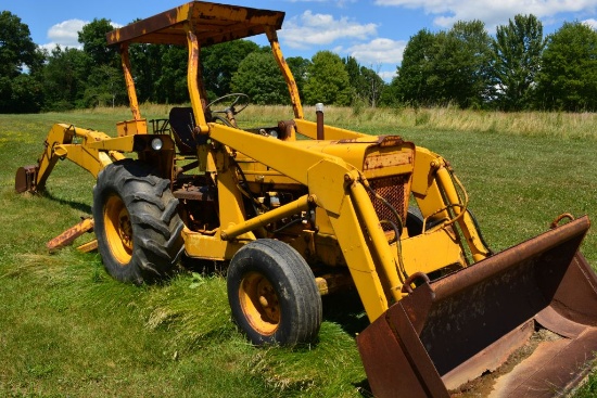 FORD BACKHOE.  HOURS SHOW 6392.  ENGINE SERIAL NUMBER IS D4NN6015G.