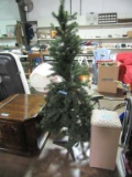 ARTIFICIAL CHRISTMAS TREE. APPROXIMATELY 5-1/2' TALL