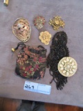 LION HEAD BELT BUCKLE, ASSORTED BROOCHES, AND ETC