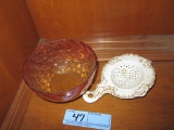 AMBER AND PINK THUMBPRINT BOWL. HAS CHIP.  TEA STRAINER
