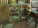 ORNATE METAL TABLE WITH GLASS TOP