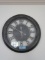 MODERN WALL CLOCK. APPROXIMATELY 2 FOOT WIDE