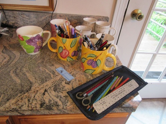 ASSORTED MUGS AND PENS AND PENCILS