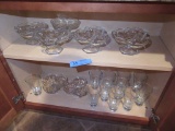VARIETY OF GLASSWARE IN CABINET