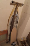 IRONING BOARD WITH IRON