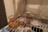 GOLD TRIM CUPS AND SAUCERS AND GOLD TRIMMED GLASSES WITH SAUCERS