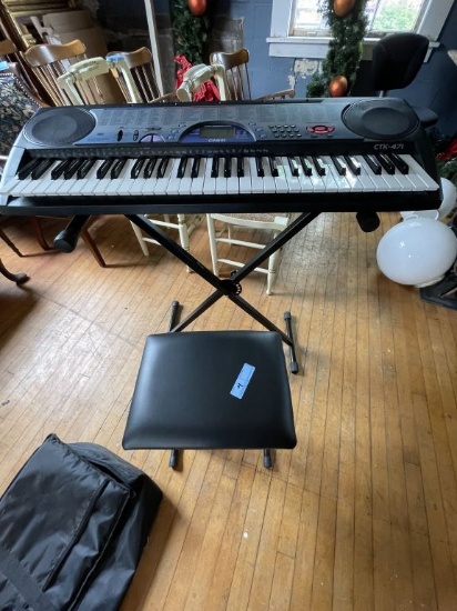 CASIO ELECTRIC PIANO WITH STAND AND BENCH