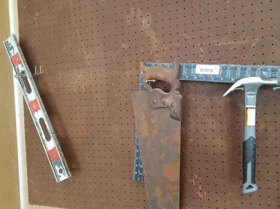level. Square. Hammer and saw