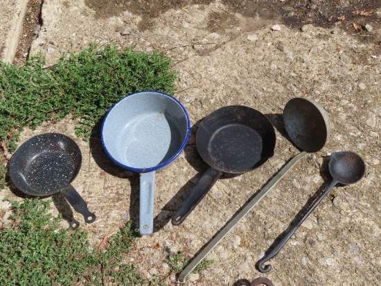 Granite ware pans with cast iron ladle, metal ladle, and number 39 pan.