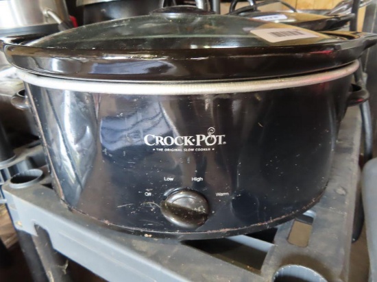 black crock pot with glass lid and insert.
