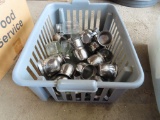 stainless steel creamers and salt and pepper shaker with plastic basket