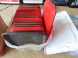 lot of red and black serving trays made by choice. includes clear tote. tote does not have lid.