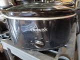 black crock pot with glass lid and insert.