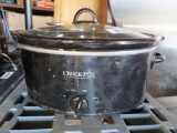 black crock pot with glass lid and insert.