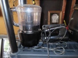 Black & Decker hand mixer with paddles and Black & Decker food processor.