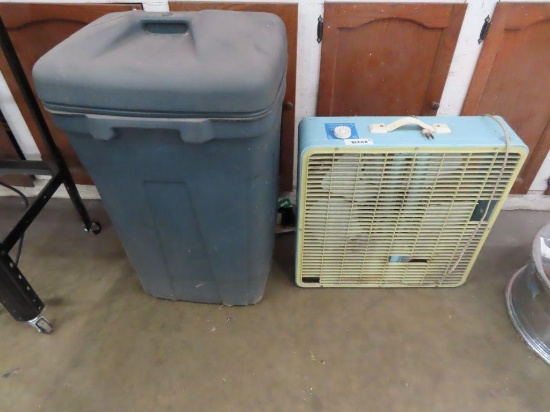 box fan and plastic roll about trash can