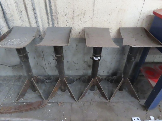 lot of four heavy duty vehicle stands