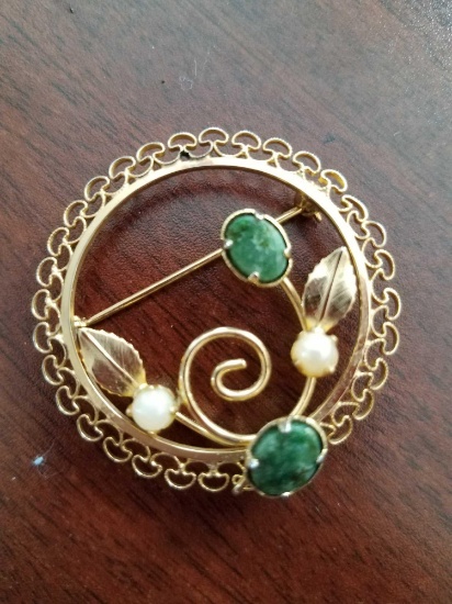 1/20 12 carat gold filled Creed pin has two green gemstones and two Pearl Light gemstones