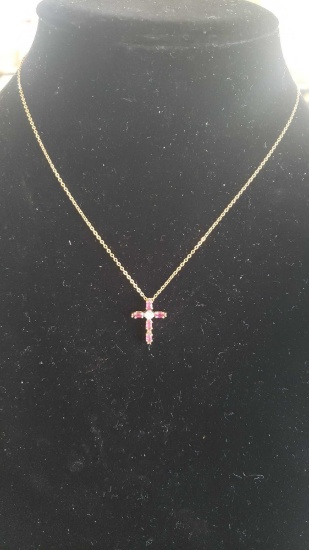 14k HR cross pendant with five rubies and one diamond on 14k necklace
