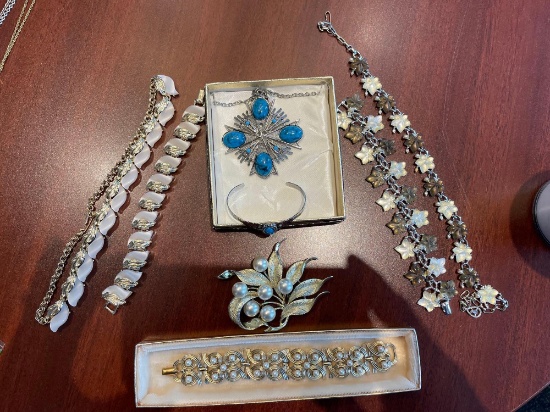 Sets of costume jewelry.