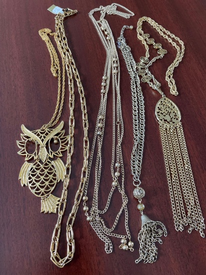 5 gold colored necklaces
