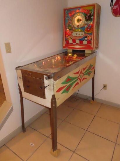 vintage Williams beat the clock pinball machine. in basement. bring tools and help for removal.