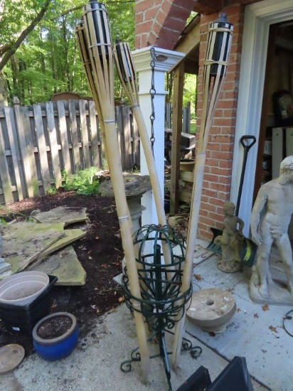 tiki torches and metal stand