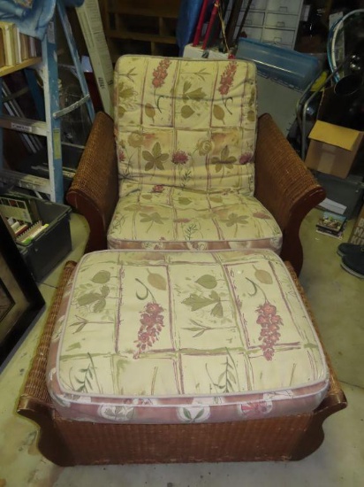 wicker and cherry chair with ottoman. in garage