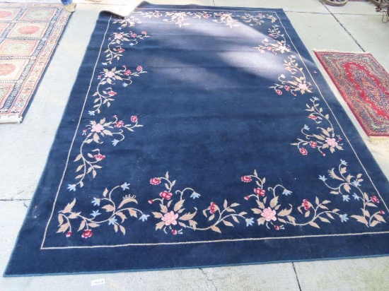 area rug, color 111 Navy camel. 8 ft wide by 11 ft 2 in long