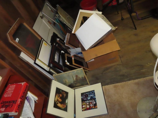 variety of picture frames, prints, and frames