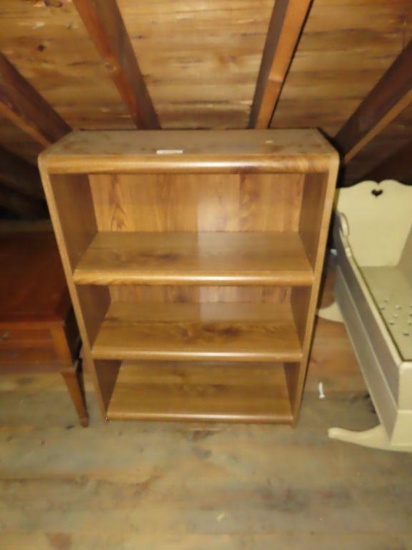 oak finish bookshelf on third floor