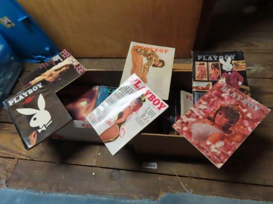 two boxes of vintage Playboy and Penthouse magazines. various dates