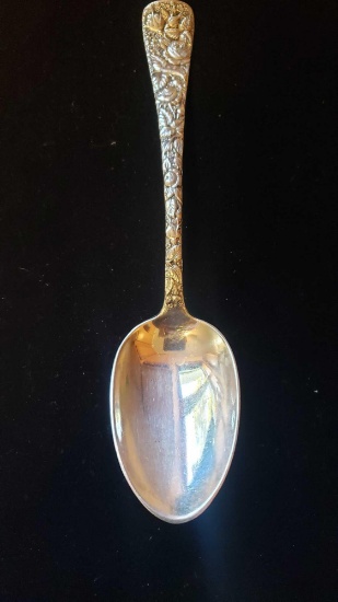 large floral spoon marked Sterling