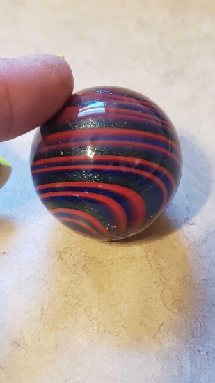 red and blue swirl with glitter marble signed Rick Davis, almost 1.5 in