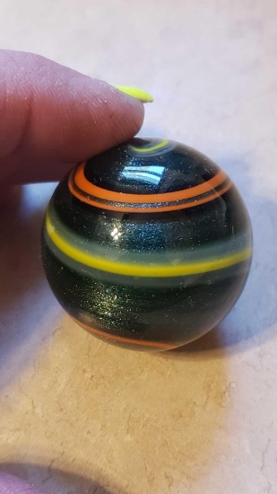 handmade yellow, orange, and gray swirl with glitter marble. signed Davis. almost 1.5 in.