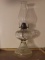 clear glass oil lamp
