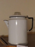 white and black percolator with glass insert and handle
