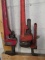 lot of three pipe wrenches. two are 24-inch and one is 10 inch.