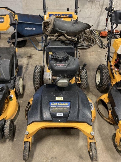 Cub Cadet 33 inch commercial wide cut mower with bagger and 10.5 horsepower engine. needs work.