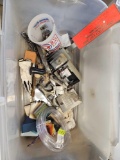 emergency exit hardware. vinyl tubing. vehicle emblems and Etc in clear tote with white lid