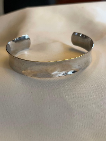 Sterling silver cuff bracelet.