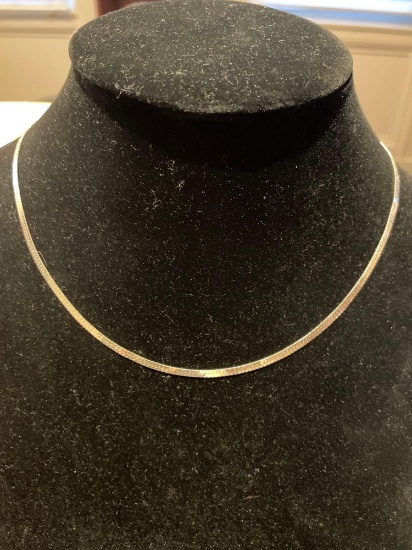 Sterling silver herringbone necklace.