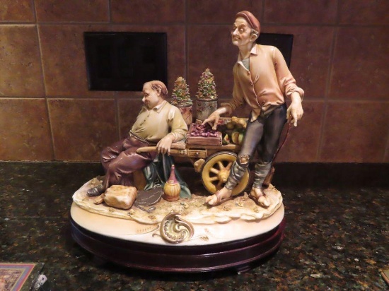 A. Borsato, Milano, made in Italy, men with cart figurine