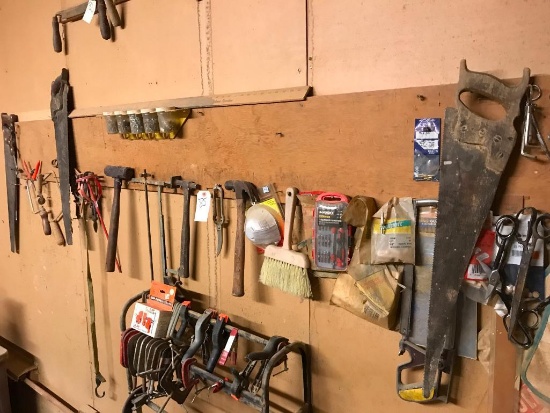 SCISSORS HAMMERS SAWS OTHER TOOLS ON WALL