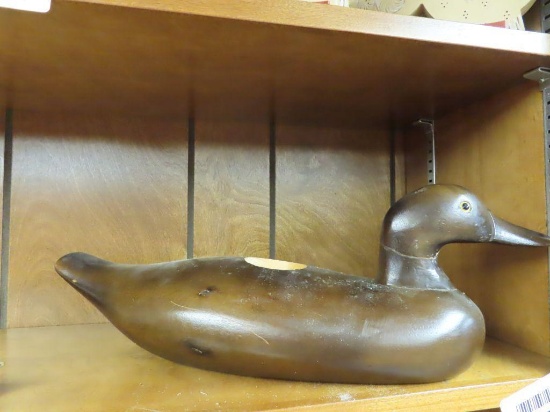 Carved duck, neck has been repaired