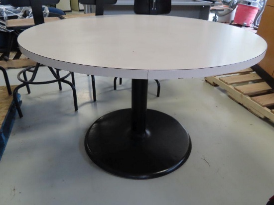 Formica top table with heavy steel pedestal base