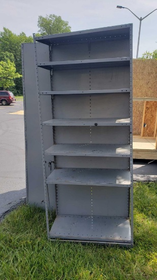 Two sets of metal adjustable shelving units. Approximately 7 ft tall by 3 ft long by 1 ft 6 in deep