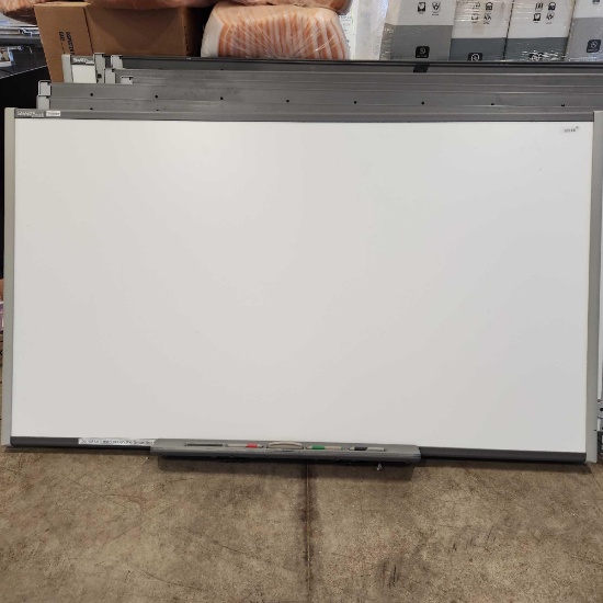 Smart Board with markers, Approximately 7 ft x 4 ft....One of the markers are missing.
