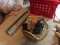 Wooden card holder. Assorted gold colored serving pieces. Party lights.
